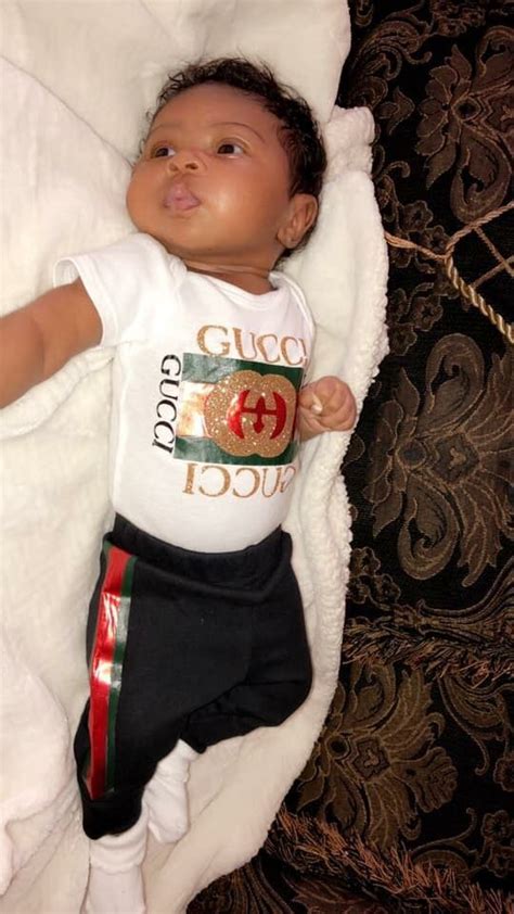 gucci baby clothing.